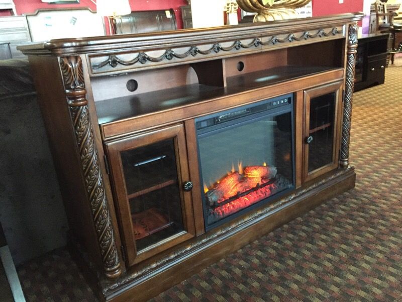Ashley north shore tv stand with fireplace online