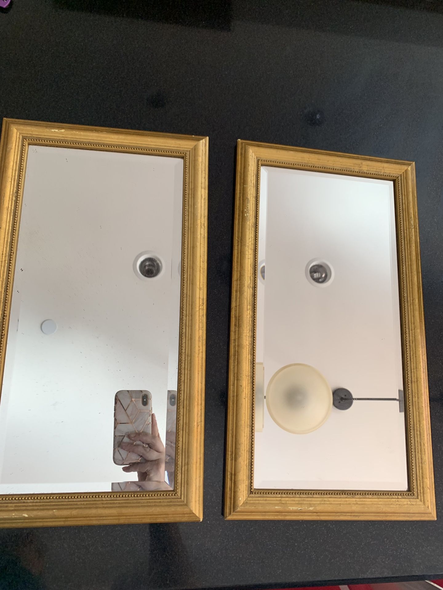 2 decorative gold mirrors