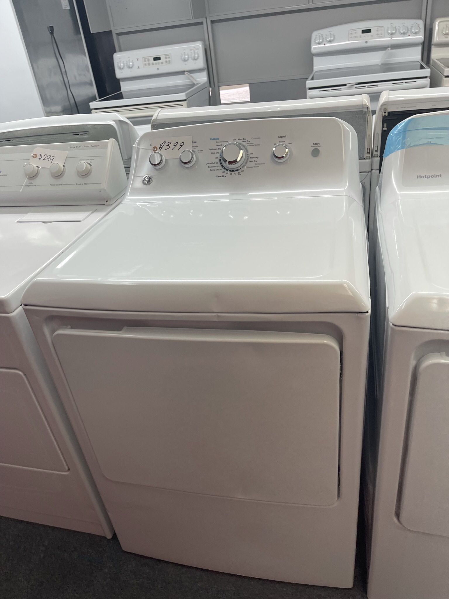 New Scratch And Dent GE Dryer. 1 year Warranty 