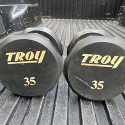 PAIR  OF  TROY  35 LB.  BARBELL  12  SIDED  URETHANE  RUBBER  DUMBBELLS. 