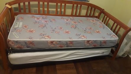 A twin bed with frame