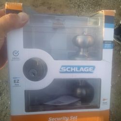 Schlage brand new door knob w dead bolt with 2 keys