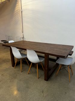 Oversized wood dining table with bench