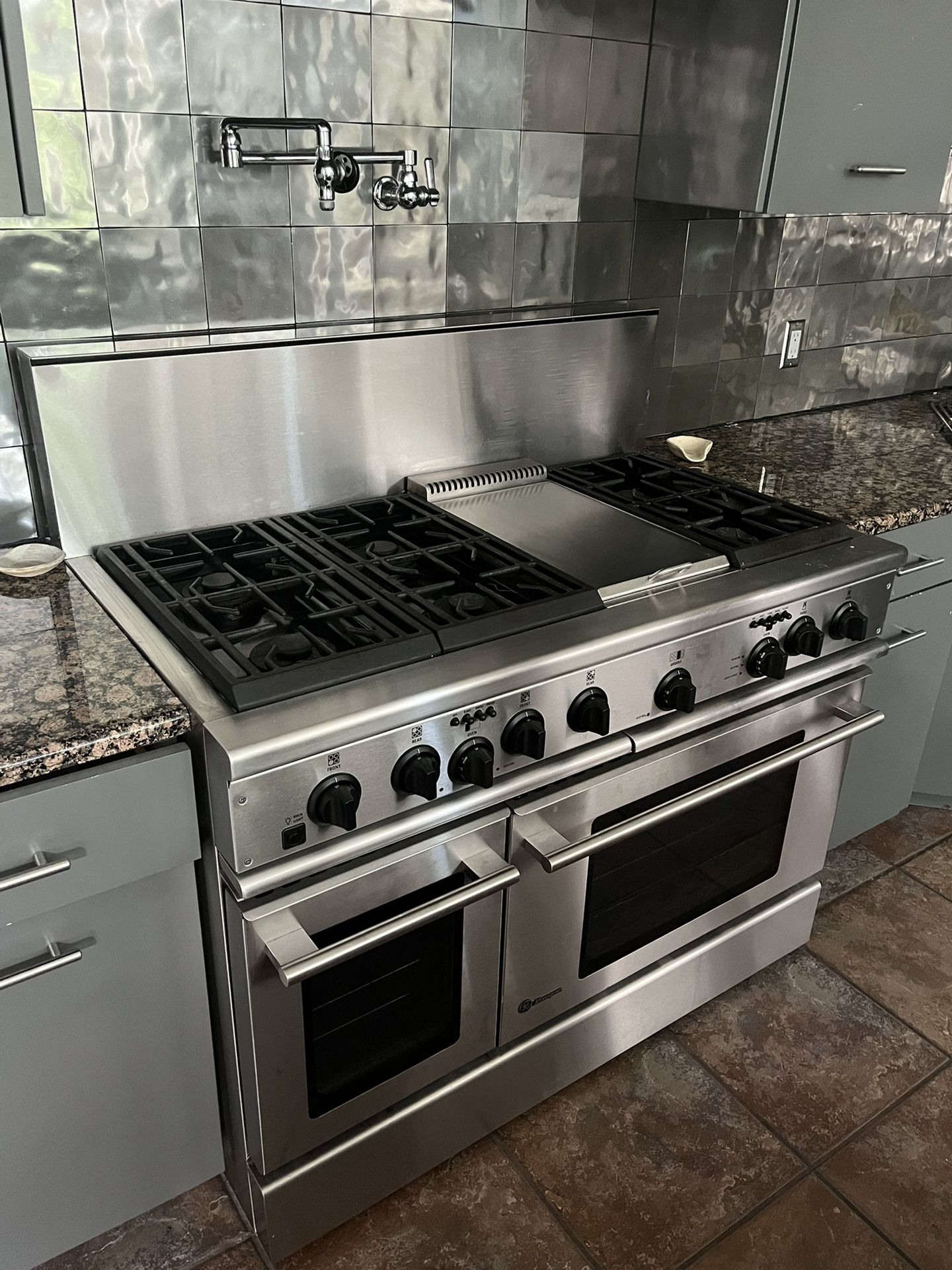 Luxury GE Monogram 6 Burner Gas Stove, Griddle, And Double Oven