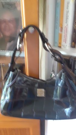 Dooneyburke good condition crocodile black