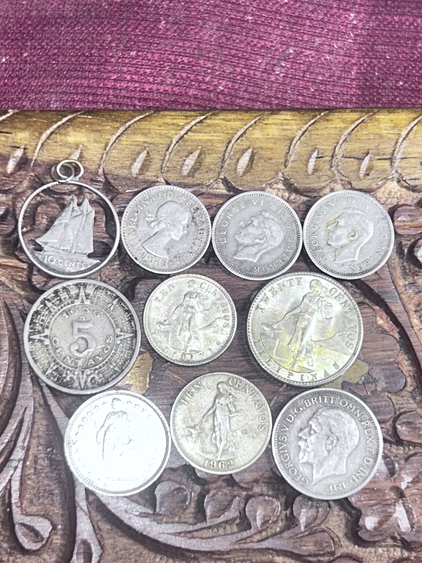 Eight silver world, coins, and one silver pendant