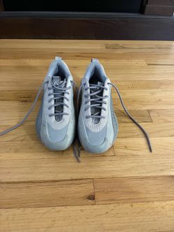 Anthony Edwards 1 Low basketball shoes in the metallic grey
