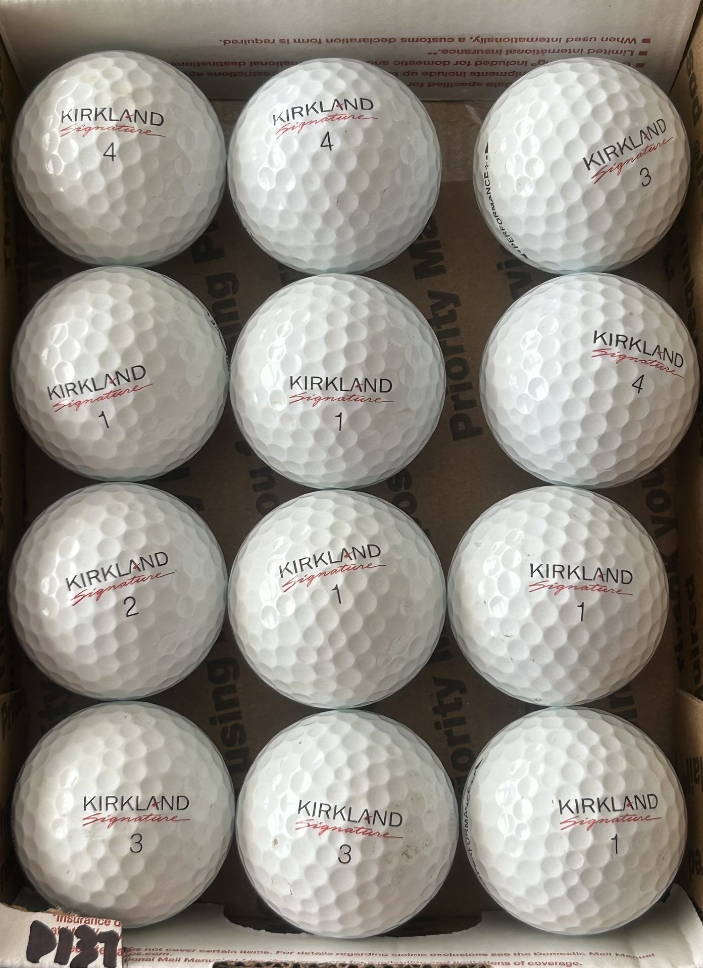 12 Kirkland White Golf Balls 5/4a Lot D037