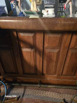 Bar and 2 stool  leather seats good condition