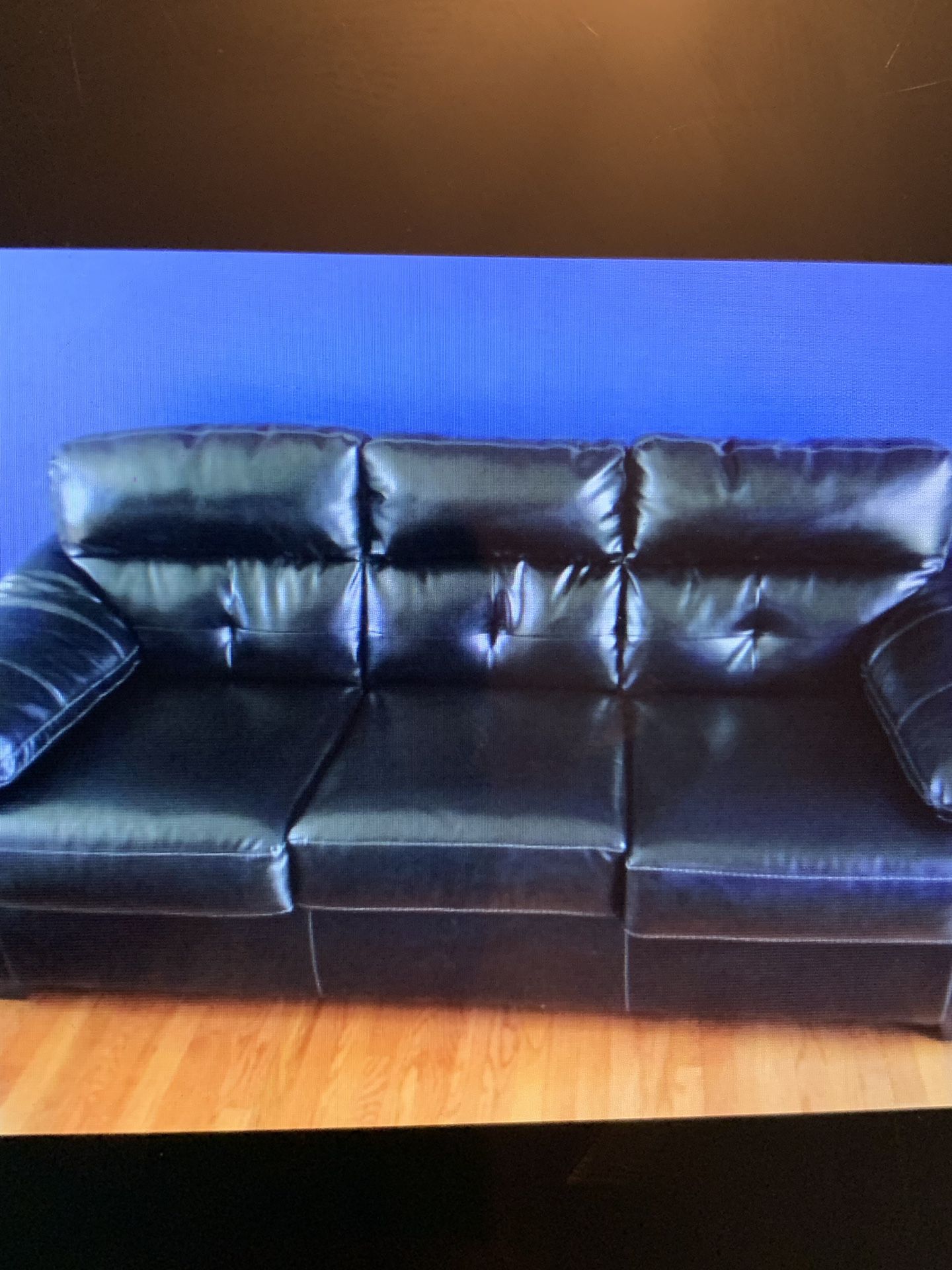 Black leather couch only 6 months old