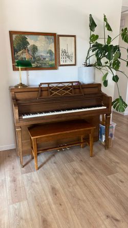 Free piano (takers must line up piano movers by July 1)