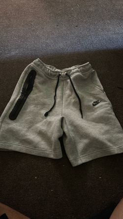 gray Nike tech shorts