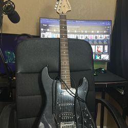 squier stratocaster electric guitar 