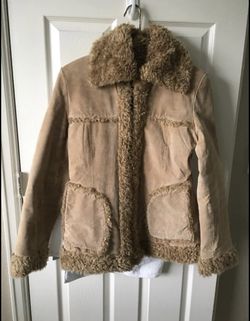 Beautiful women leather jacket with fur
