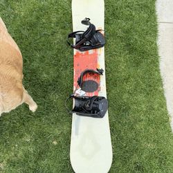 Salomon Snowboard and DaKine Bag