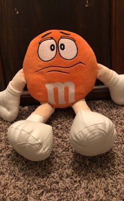 orange M & M plush toy