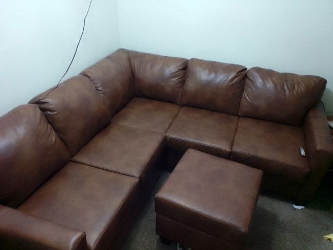 Brand New 2 Piece Sectional With Ottoman