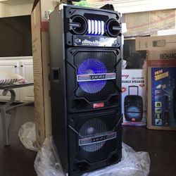 Portable Music player  Double 10” Woofer  Bluetooth speaker - Fm Radio - Rechargeable  USB PORT - SD MEMORY SLOT - Portable  Compatible with any Bluet