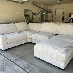 Ivory Living Room Sectional With Ottoman