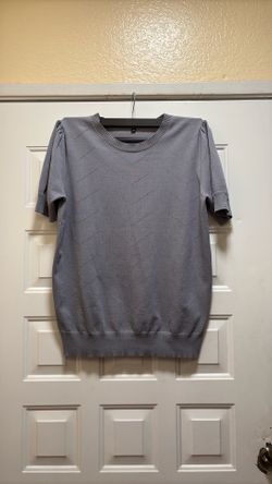 blusa color gris extra Large $10