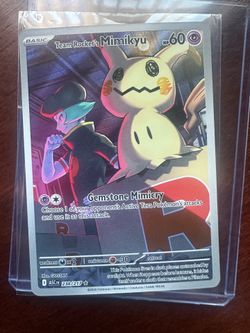 Team Rocket’s Mimikyu 238/217