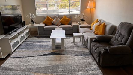 2 sofa and easily seats 6 adults with 2 tea tables. TV stand