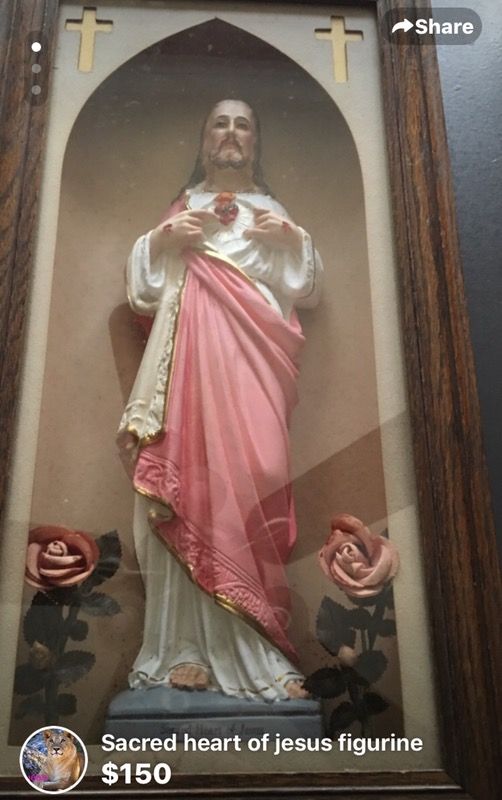 Enclosed sacred heart of Jesus figurine