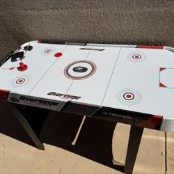Triumph Overtime Air Hockey Table with Laser based digital score keeper.