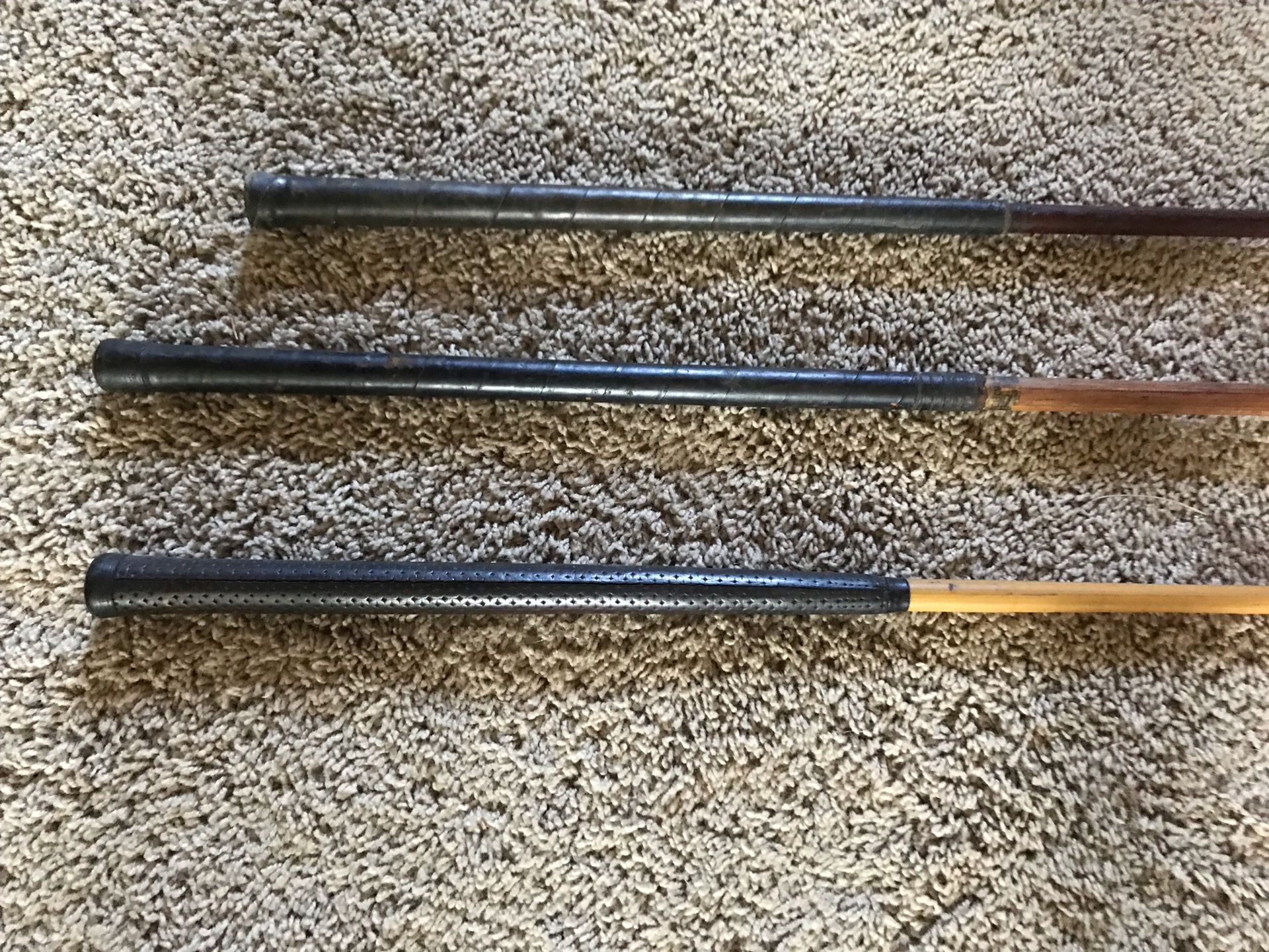 Three Vintage Wooden Golf Clubs..$15 each