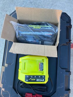 Battery and charger Rioby