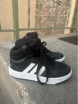 the adidas Hoops 3.0 Mid in the classic Core Black / Cloud White kids size 12