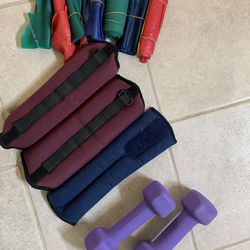 A Pair Of Hand Weights, Leg Weights, Stretch Bands For Exercising