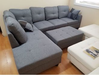 Free local area curbside delivery gray linen sectional with pillows and ottoman