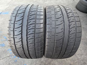 2 USED TIRES PIRELLI 265/35/22