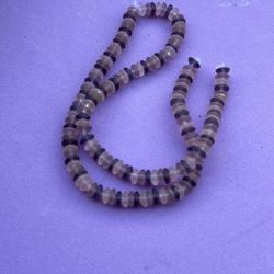 String Of Purple And Lavender Beads 