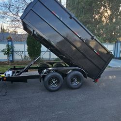 NEW DUMP TRAILER 12FT EQUIPPED ROLLING TARP AND SPARE TIRE REMOTE CONTROL ELECTRIC BRAKES LIGHTS,READY FOR WORK TITLE IN HAND FOR ANY QUESTION TEXT ME