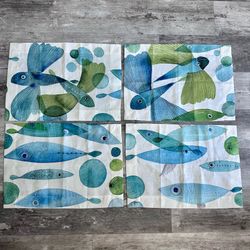 Set of 4 New w/out tags Linen placemats made in Italy by The Napking's company "Pesci Volanti" collection, featuring stylized flying fish. 20 1/2” x 1