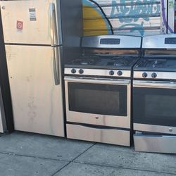 stove and fridge. $800 both item free curbside delivery