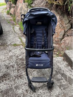 Zoe travel stroller with accessories