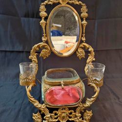 Antique French dore bronze vanity set with mirror, box, and glass holders.  This type of vanity set, often referred to as a nécessaire de toilette or 