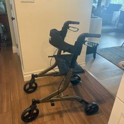 Adult Rollator - 4 Wheels - New Condition 