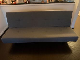 IKEA futon , sofa , good condition and clean , first person that brings $40 now take it Costa Mesa