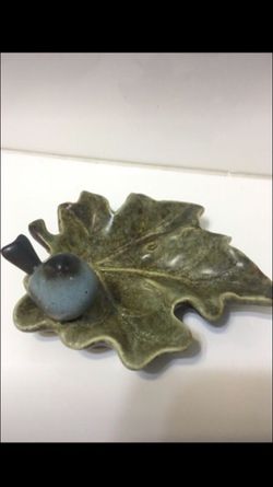 Antique Dish with Blue bird sitting on a leaf