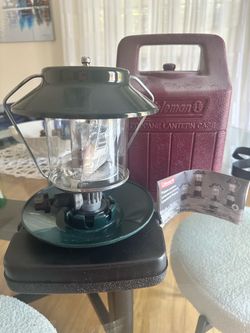 2 Coleman lanterns with cases