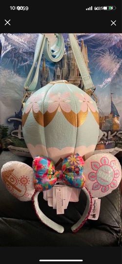 Walt Disney Parks It’s A Small World Balloon Purse Authentic Disney with matching ears NWT serious inquires only  Pick up location in the city of Pico