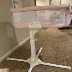 HALO BassiNest Swivel Sleeper – Adjustable Bedside Bassinet (Pink)
