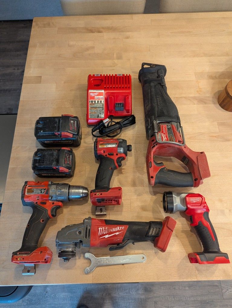 Milwaukee M18 Fuel Kit Drill/Impact/Grinder/Sawzall