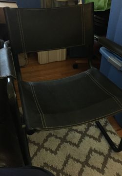 Black leather chair , Great for any room