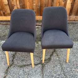 MCM-style navy blue cushioned chairs pair
