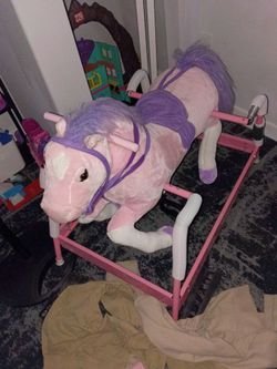 Ride on pink horse